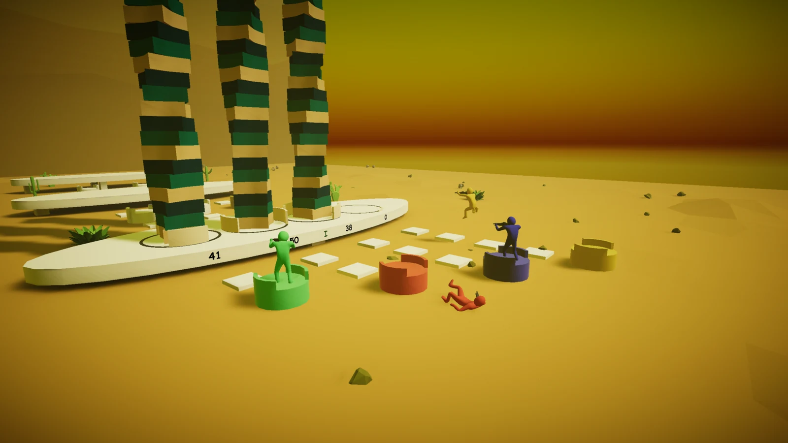 The Fire Ballers key art: a striped tower standing on a launch platform marked with distance numbers, with small characters on coloured pedestals around it and debris scattered across the sand.